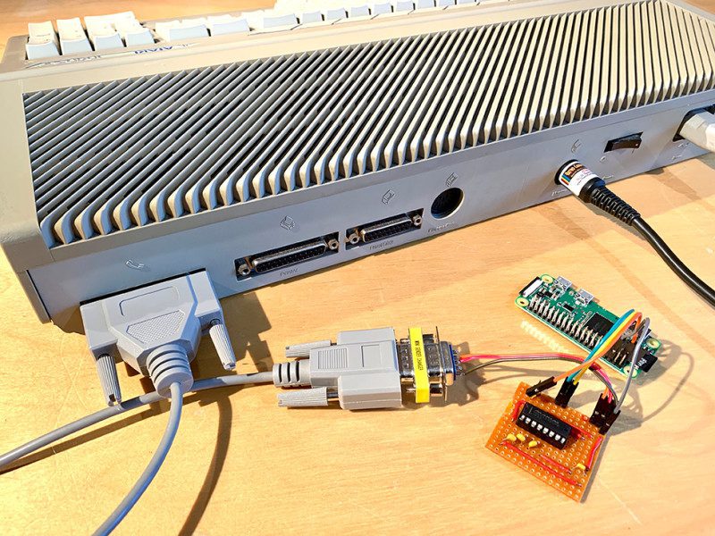 By interfacing the Raspberry Pi computer UART interface to RS232 and then using WiFi, we bridge the gap between old and new technology