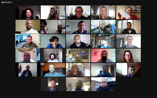 A screenshot of a video call gallery with 23 participants
